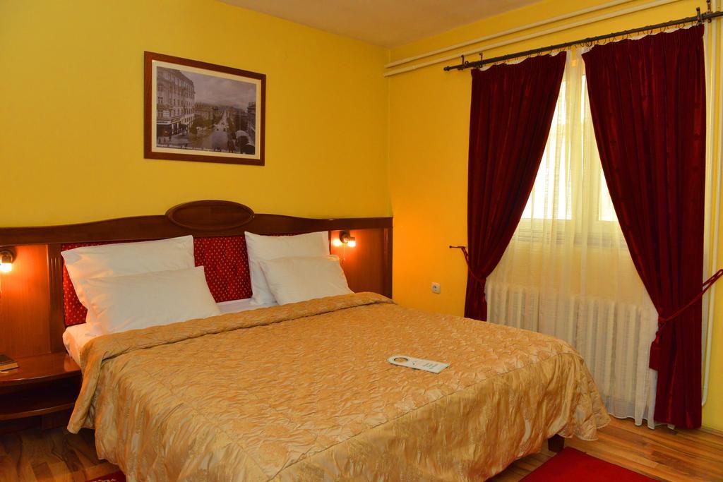Manjez Centar Hotell Beograd Rom bilde
